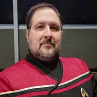 Admiral Greg Mortensen, Commanding Officer of the USS Typhon